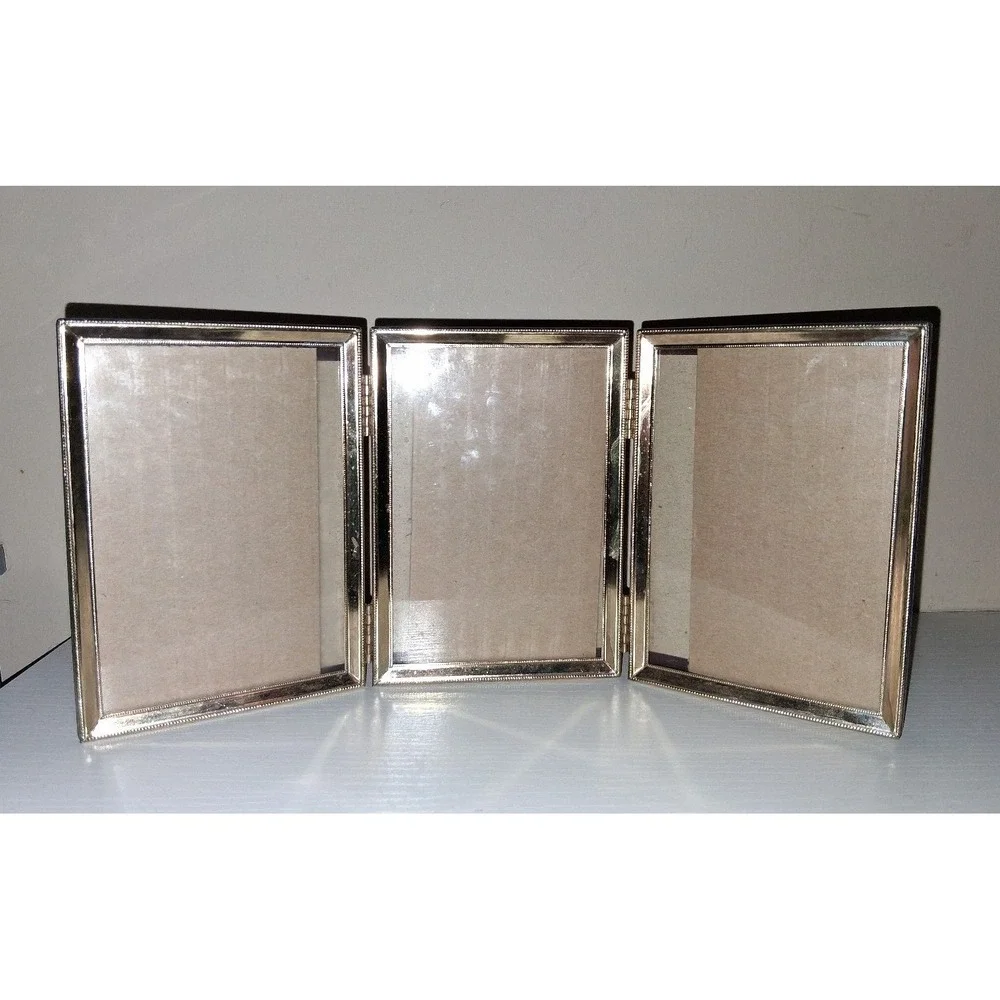 Vintage Gold Tone Tri-Fold Hinged Tabletop Picture Frame Holds Three 3.5 x 4.5
